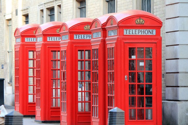 photo of vintage telephone booths red